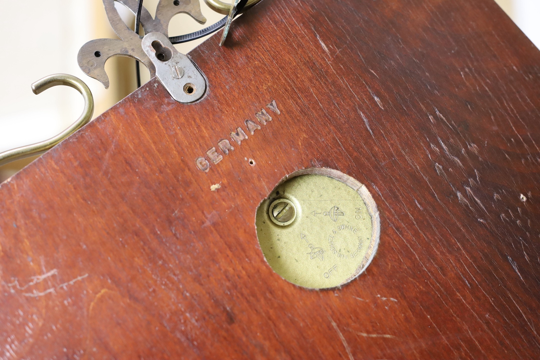 A Schatz brass bulkhead timepiece, mounted
